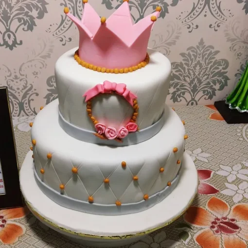 2 Tier Pink Crown Fondant Cake with Delivery in Noida, East Delhi, and South-East Delhi